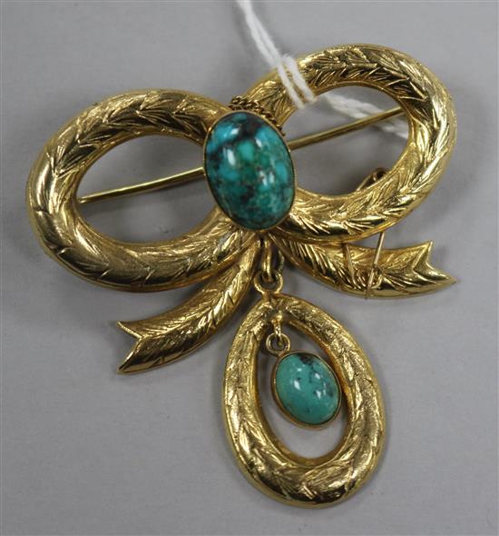 A Victorian style 9ct gold and turquoise drop ribbon bow brooch, 52mm.